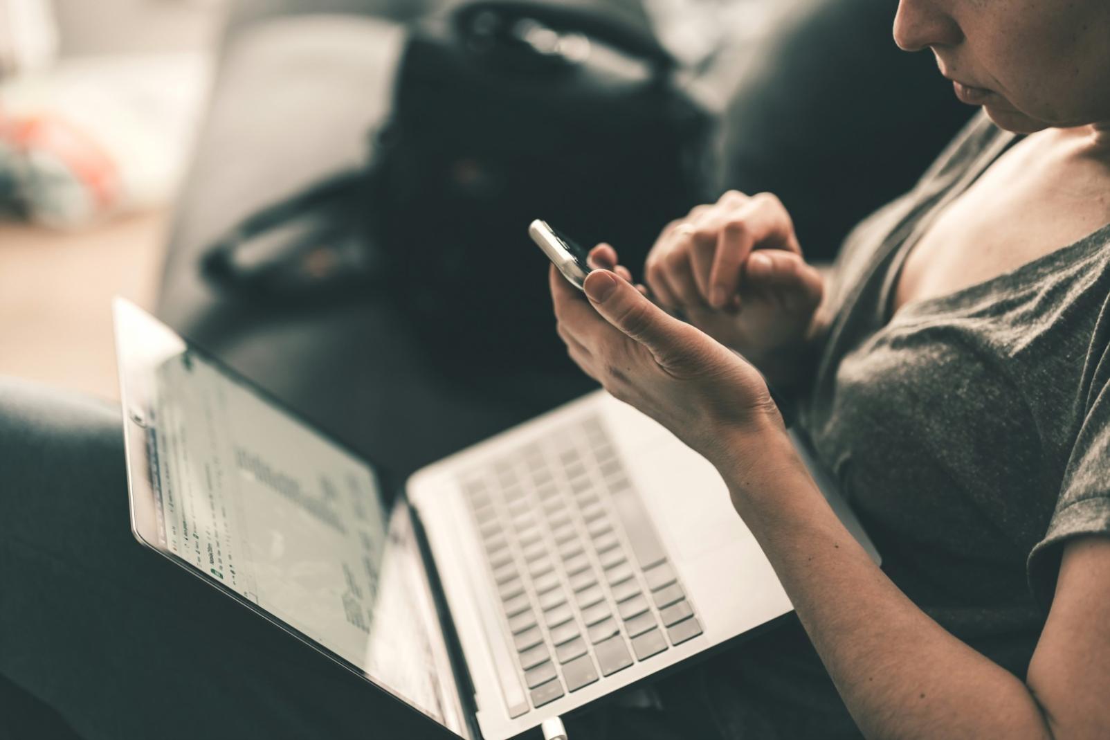 Modern coding workspace with multiple monitors displaying front-end development projects